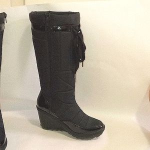 Water-resistant knee high boots.